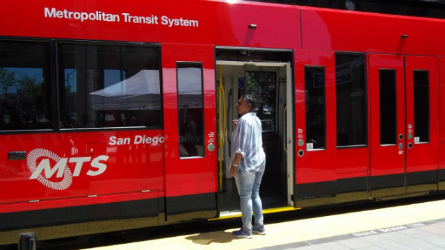 Trolley rider inspects new car