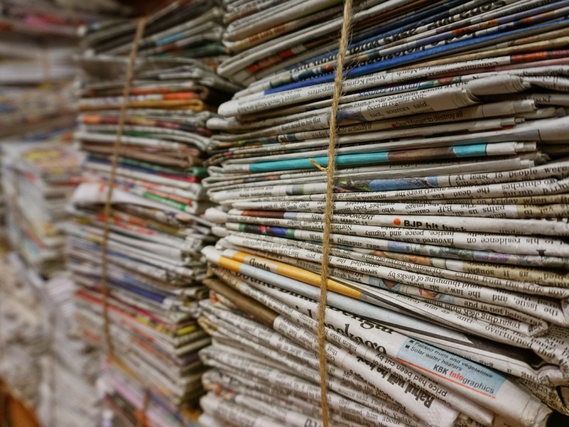 Stacks of newspapers. Courtesy Pixabay / Pexels