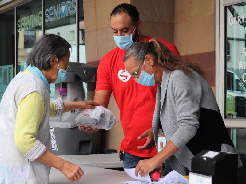 Cody Martinez distributing food