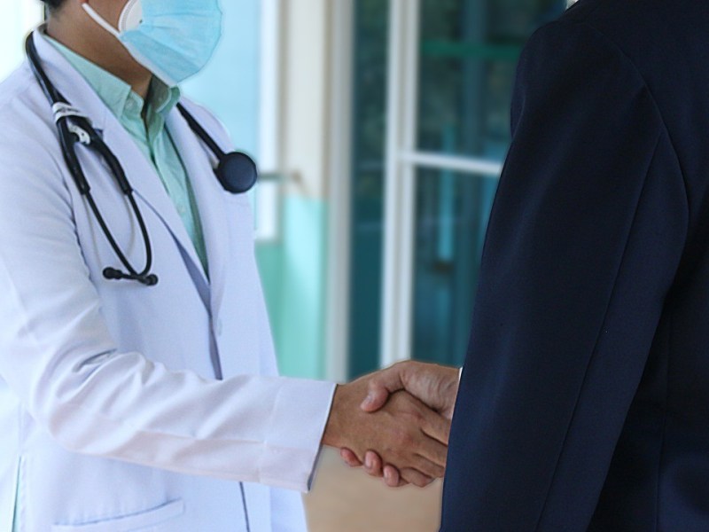 Doctor greets patient