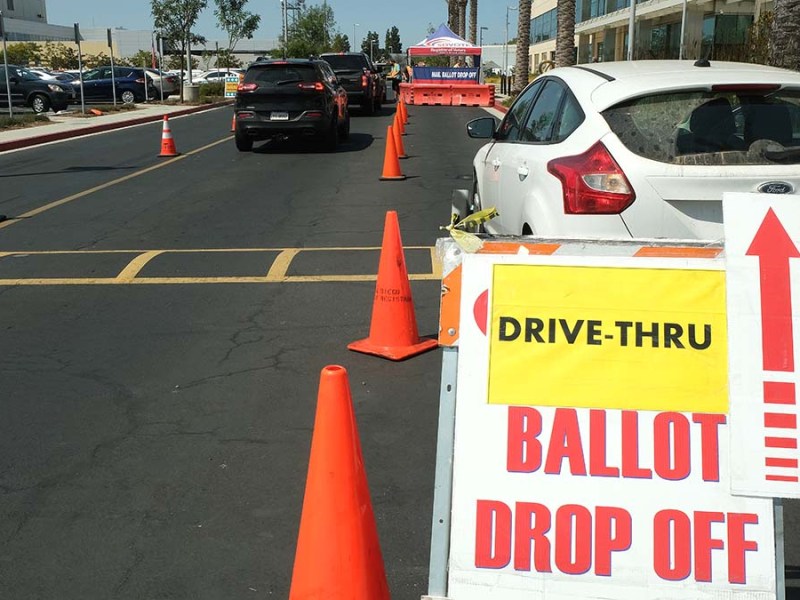 Many people dropped off their ballots at the country Registrar of Voters office. Photo by Chris Stone