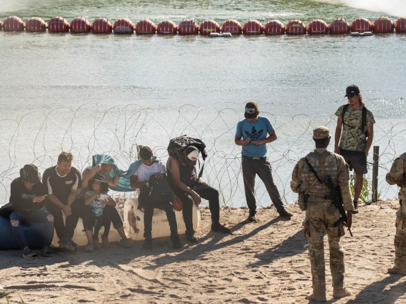 Migrants and floating barriers