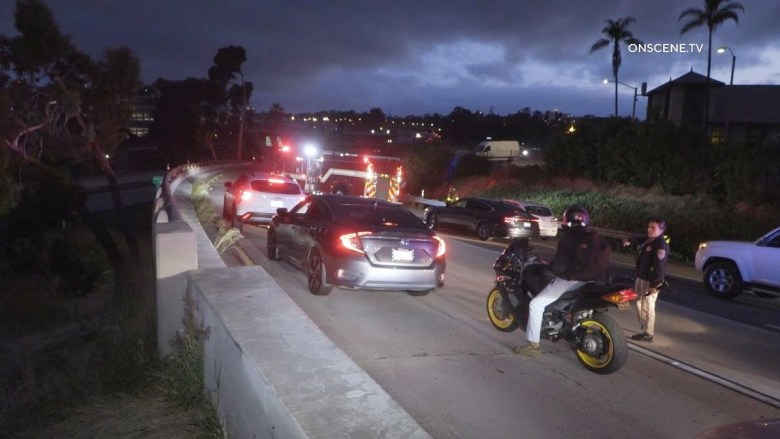 Vehicles stopped on freeway ramp