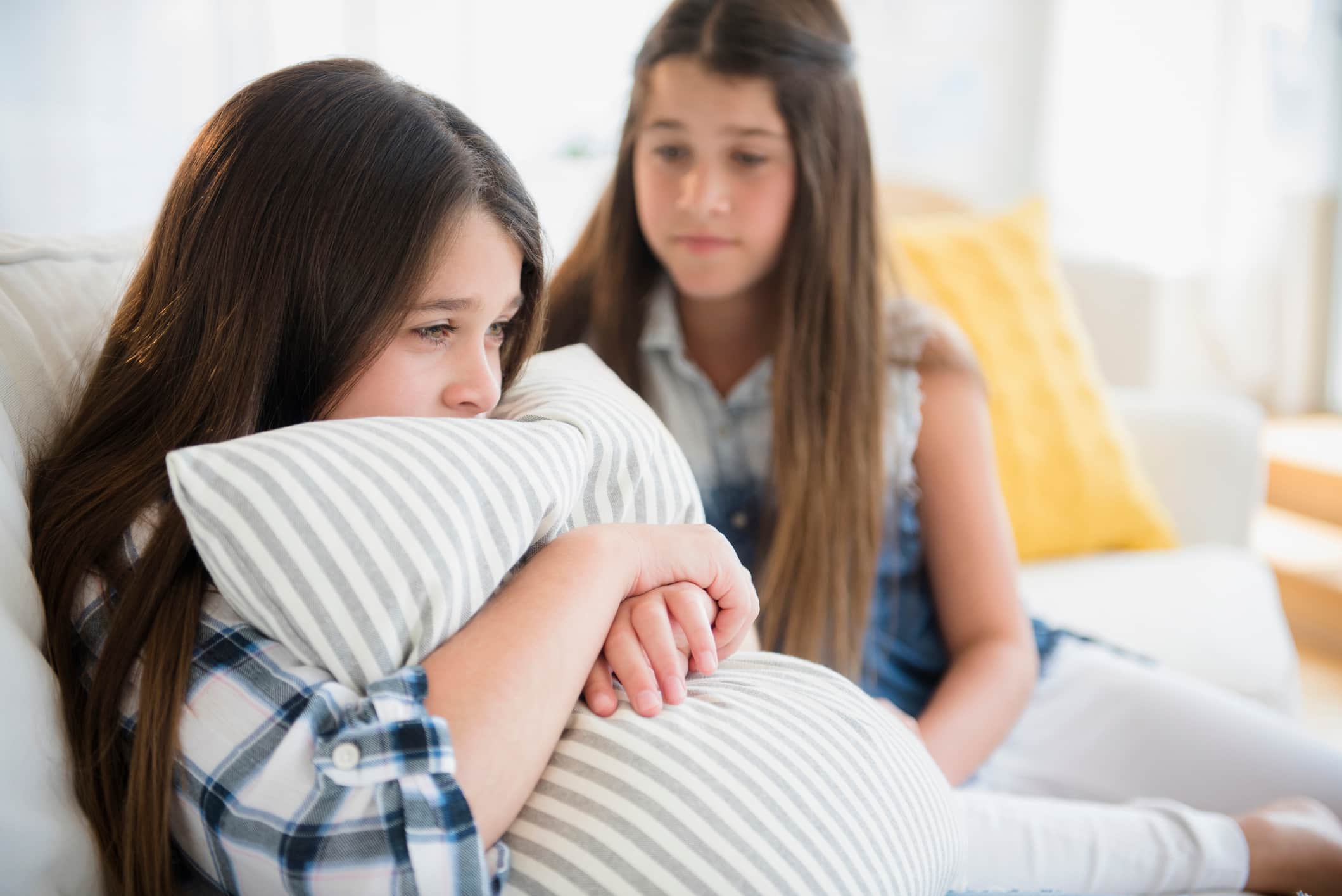 girl-comforting-her-sister-habits-of-empathetic-people