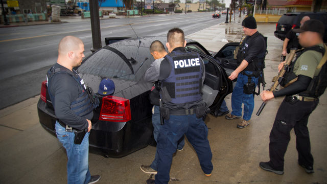 ICE officers detail a suspect