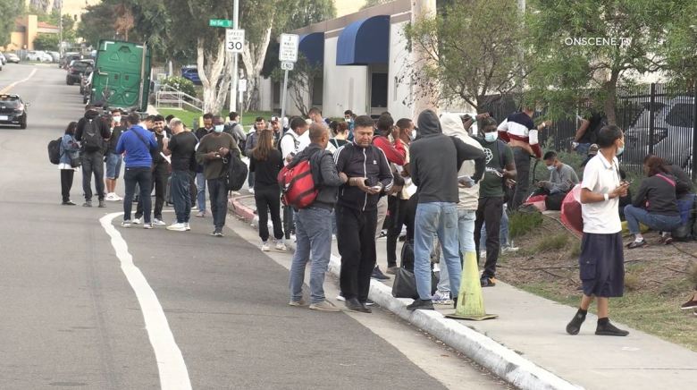 Migrants at trolley station