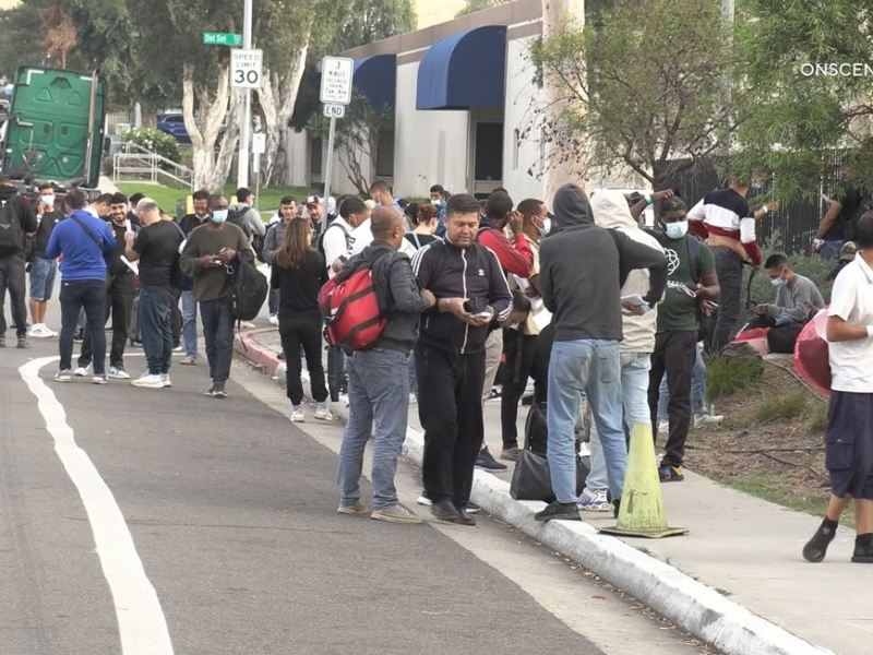 Migrants at trolley station