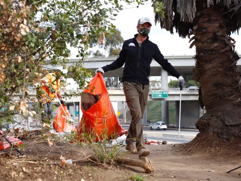 Gov. Gavin Newsom at homeless encampment