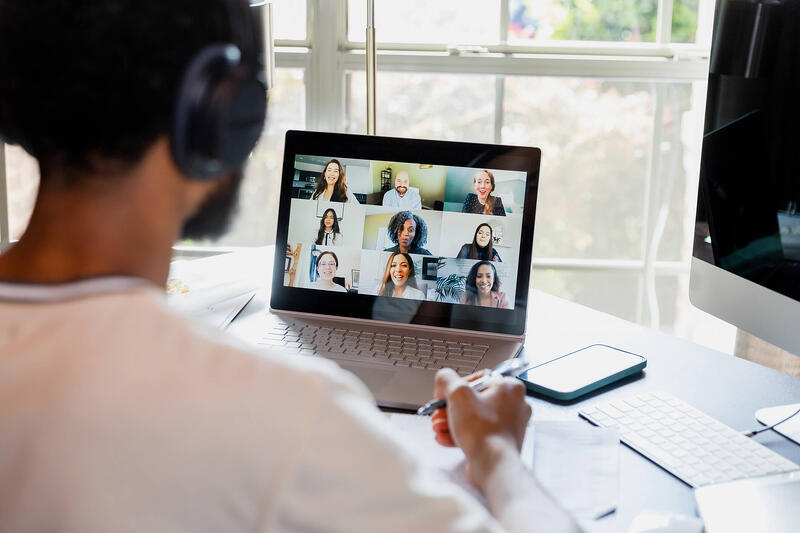 over the shoulder of a man in a virtual corporate training program