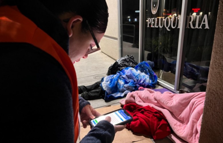 Volunteer counting homeless