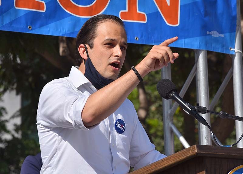 City Council candidate Raul Campillo speaks to union workers at a car rally downtown on Election Day.