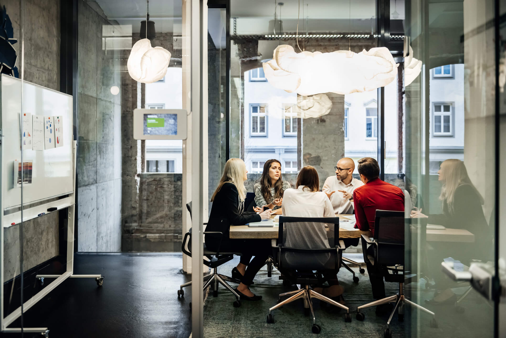 team sitting around a table during a training