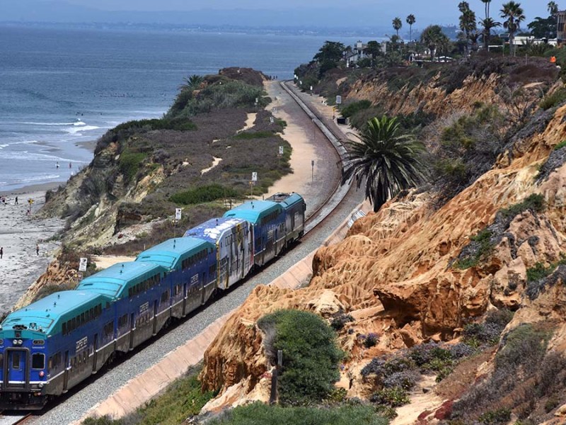 The Coaster train travels along the coast in Del Mar. Photo by Chris Stone