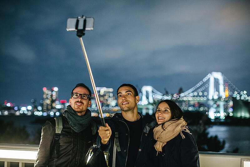 three-tourists-taking-a-selfie-in-japan-personal-goals