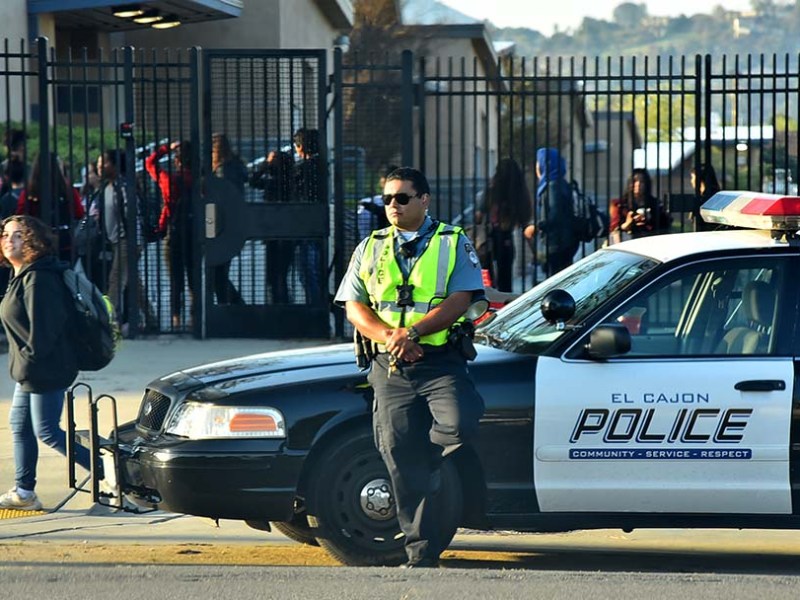 El Cajon police blocked the road in front of El Cajon Valley High School to car traffic.