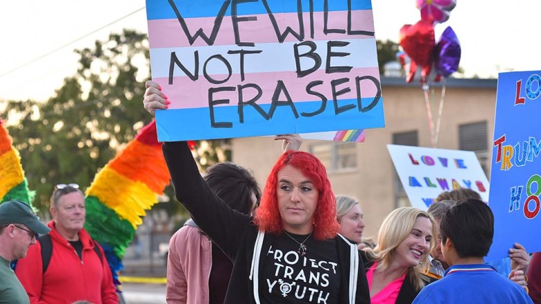 A man joined counter protestors at El Cajon Valley High School supporting the LGBTQ community.